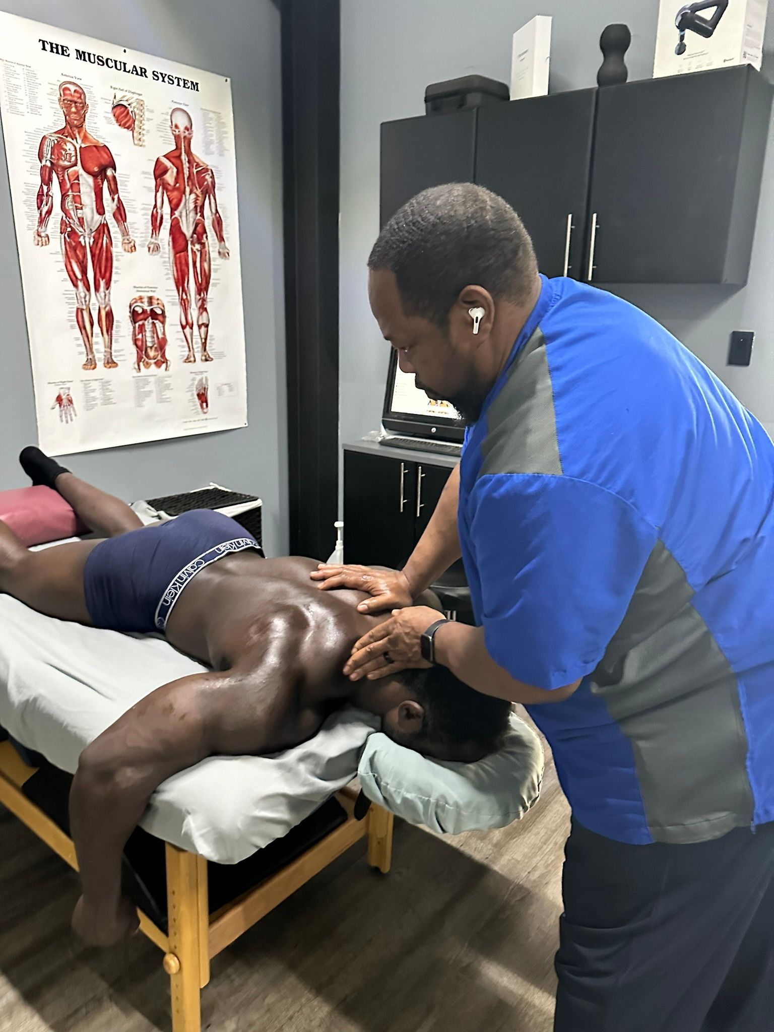 Marvin Joiner performing therapeutic massage at Advanced Muscle Care and Recovery in Katy, TX