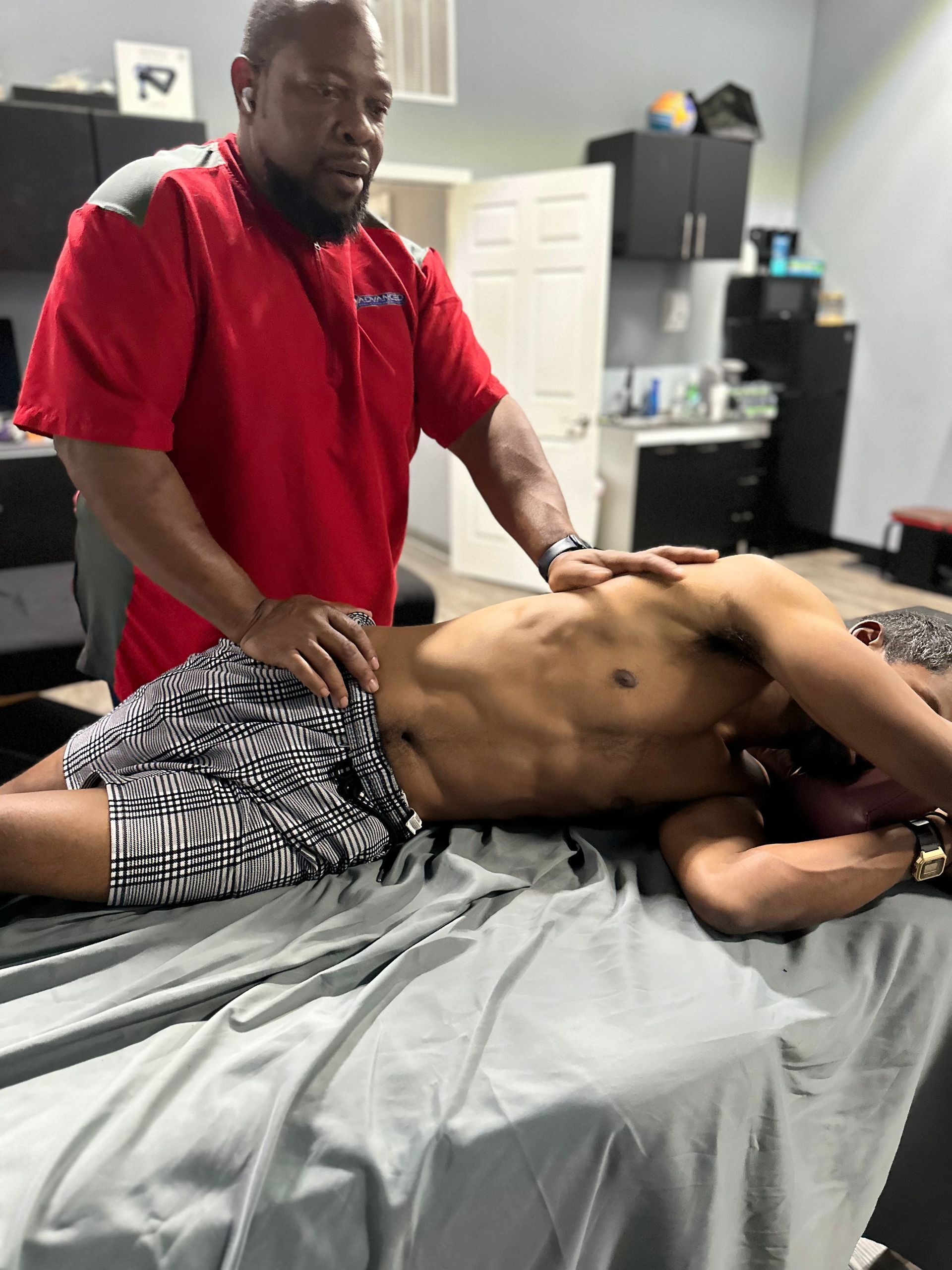Therapy consultation at Advanced Muscle Care and Recovery